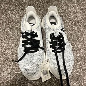 Brand new never worn Adidas sneakers